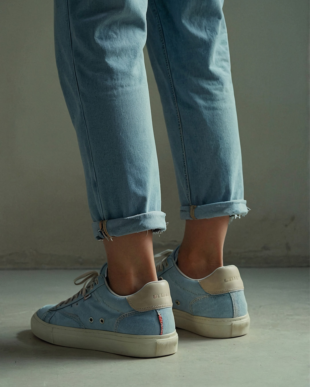Which colour looks best with dark blue jeans?